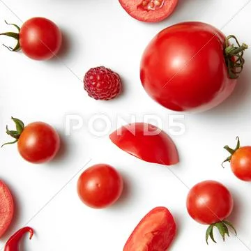 Tomato cherry and raspberry Stock Photos
