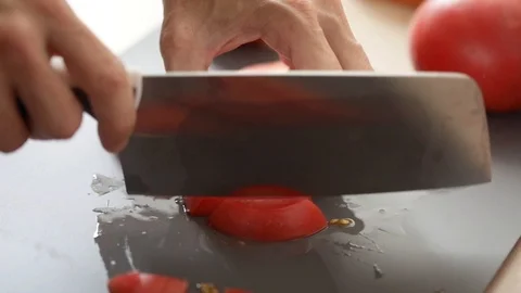 Tomato chopping, steadicam close-up Stock Footage 91175659