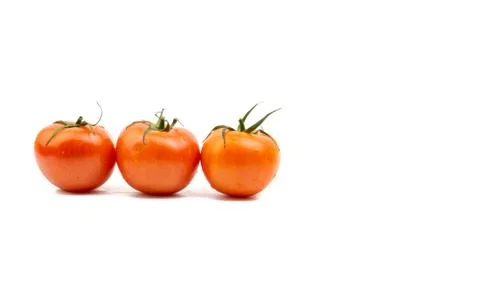 Tomato closeup on white background. Selective focus 库存照片