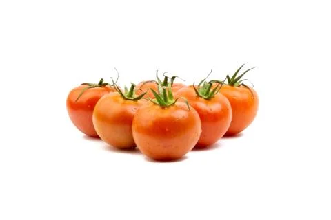 Tomato closeup on white background. Selective focus 库存照片