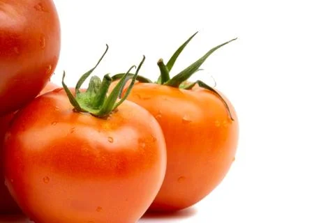 Tomato closeup on white background. Selective focus 库存照片