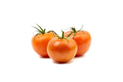 Tomato closeup on white background. Selective focus 库存照片