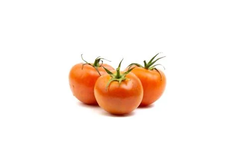 Tomato closeup on white background. Selective focus Fotos Stock
