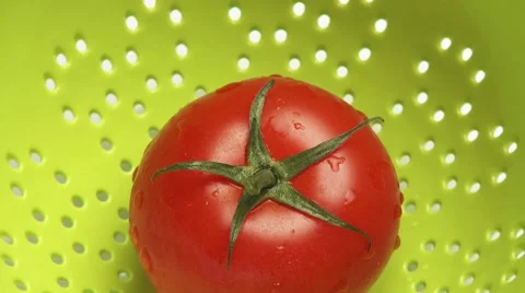 A tomato in a colander Stock Footage 8571145