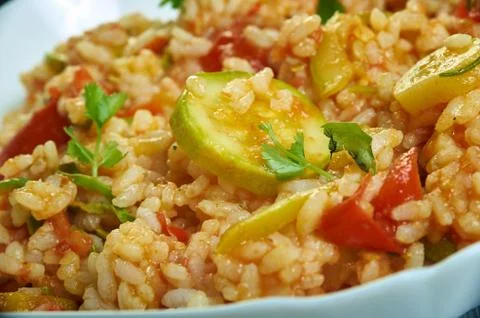 Tomato  courgette risotto Fotos de archivo