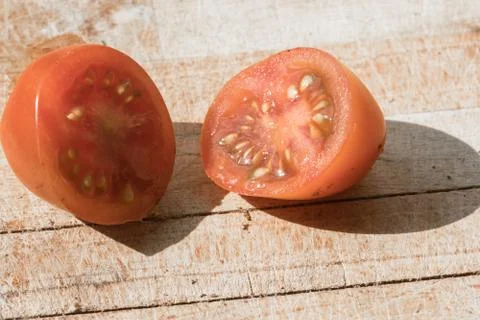 Tomato cut isolated Stock Photos