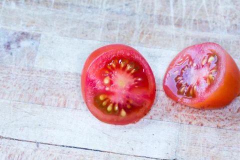 Tomato cut isolated Stock Photos
