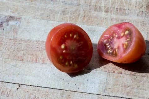 Tomato cut isolated Stock Photos