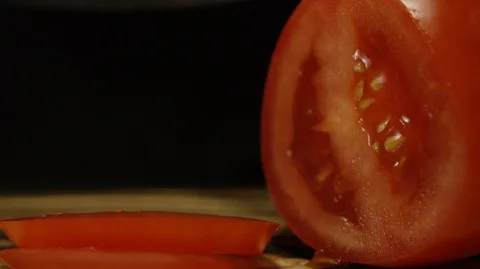 Tomato cut with a knife Stock Footage 127837642