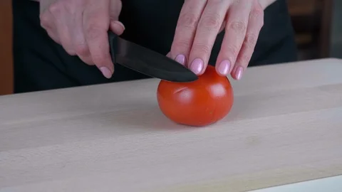 Tomato on the cutting Board Video stock 108133761