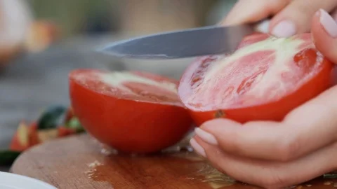 Tomato cutting. Close-up. Slow motion. Stock Footage 114870199