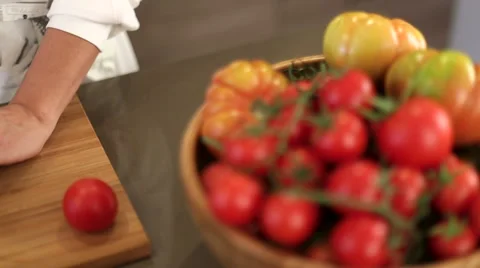 Tomato Cutting Details in a  Kitchen Stock Footage 60765885