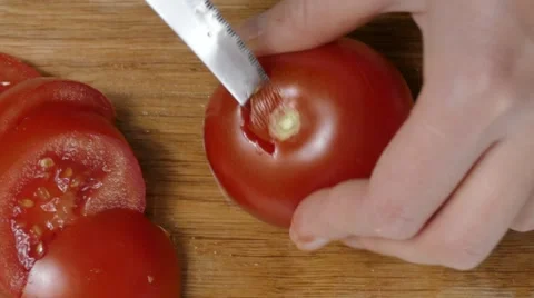 Tomato cutting on pieces, 4k Stock Footage 60777527