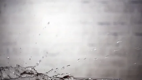 Tomato drop down in water with splashing, slow motion Stock Footage 71457557