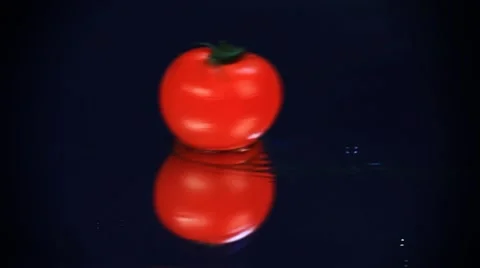 Tomato enters the frame. Stock Footage 45504218