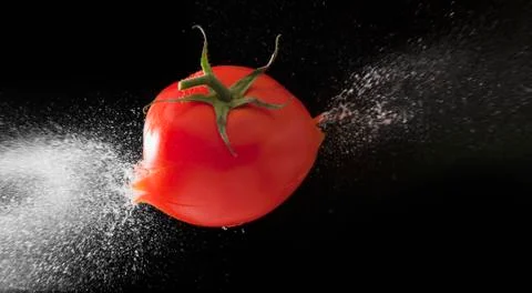Tomato exploding Stock Photos