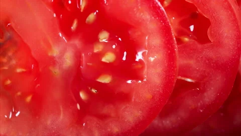 Tomato Falling in Super Slow Motion (1000fps) - Mesmerizing Fruit Impact Watch a Stock Footage 253300931