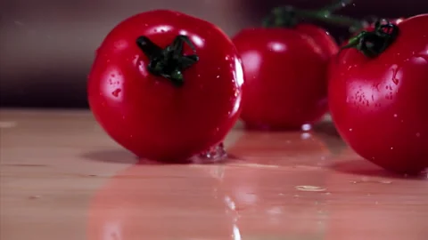 Tomato Falling in Super Slow Motion (1000fps) - Mesmerizing Fruit Impact Watch a Stock Footage 280045518
