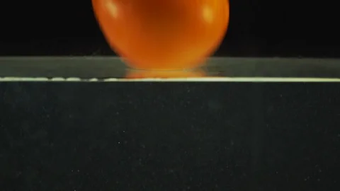 Tomato falling into the water Stock-Footage 87691263