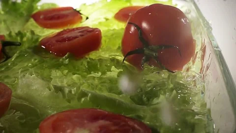 Tomato falling into the water with splashes Stock Footage 71449866