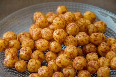 Tomato-flavored puffed snack biscuits Photos