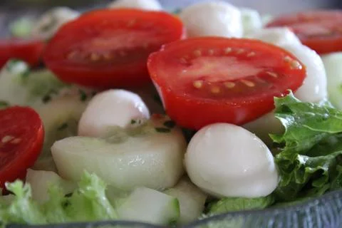 Tomato in the foreground Stock Photos