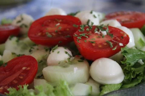 Tomato in the foreground Stock Photos