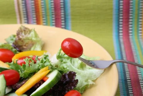 Tomato on Fork Stock Photos