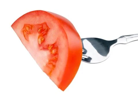 Tomato on fork Stock Photos