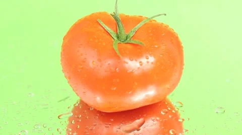 Tomato on green screen Stock Footage 8992405