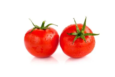 Tomato isolated on white. Stock Photos