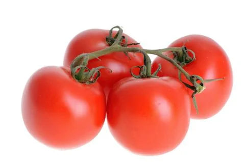 Tomato isolated on a white studio background Stock Photos