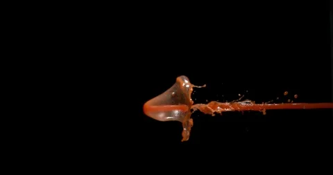 Tomato Juice Exploding and Splashing on Black Background, Slow Motion 4K Stock Footage 120041038