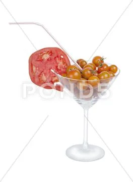 Tomato juice in the glass, orange cherry tomatoes and red tomatoes on vine is Stock Photos