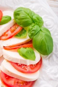 Tomato with mozzarella cheese Stock Photos