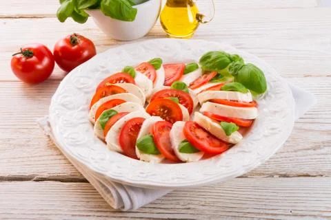 Tomato with mozzarella cheese Stock Photos