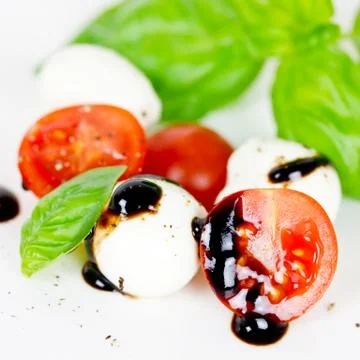 Tomato with mozzarella Stock Photos