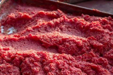 Tomato paste making process of angled shot under afternoon sun Stock Photos