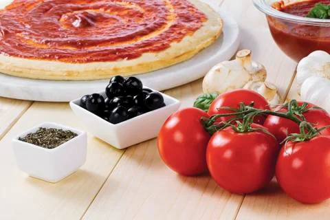 Tomato paste pizza dough Stock Photos