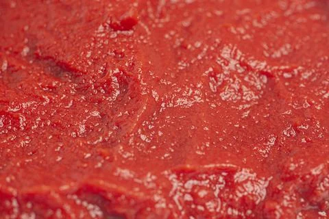 Tomato paste texture background close-up. Stock-Fotos