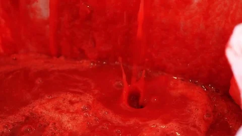 Tomato pulp flowing- Ancient tradition in South Italy- slow motion Stock Footage 80350517