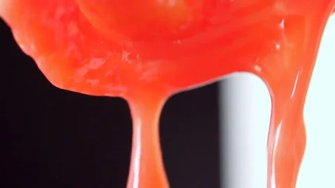 Tomato pulp flowing- close up Stock Footage 83695710