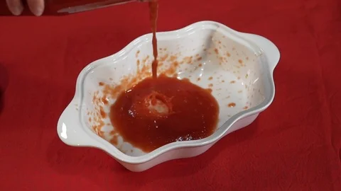 Tomato puree in the ceramic Stock Footage 74669701