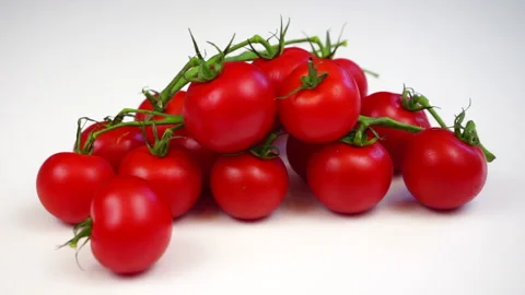 Tomato rolls, cherry tomatoes on a white background Stock Footage 131467763
