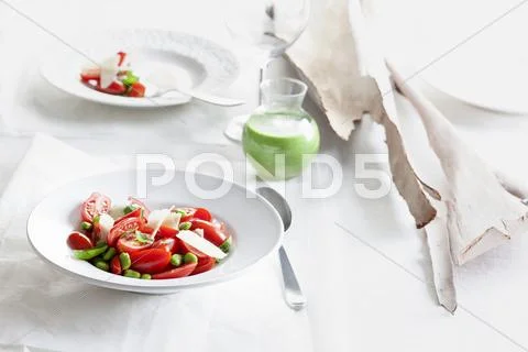 Tomato salad with broad beans Stock Photos