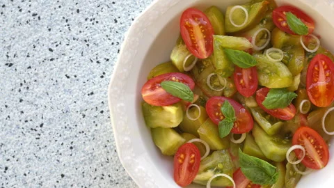 Tomato Salad with cherry red and yellow-green tomatoes. Stock Footage 311949784