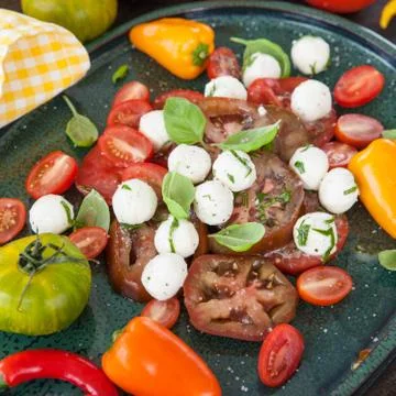 Tomato salad with mozzarella Stock Photos
