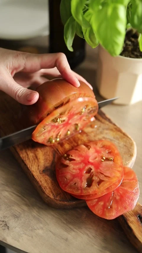 Tomato salad sliced vegetables, olive oil carpaccio food preparation tasty Stock Footage 339697483