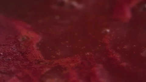 Tomato sauce boiling slow motion Stock Footage 131858328