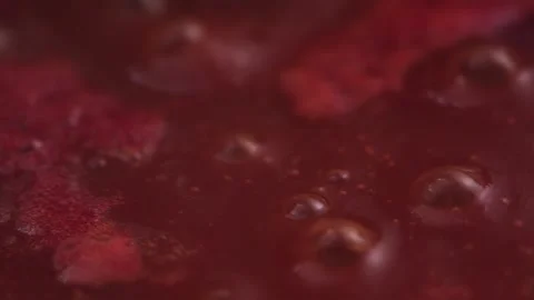Tomato sauce boiling slow motion Stock Footage 131858613